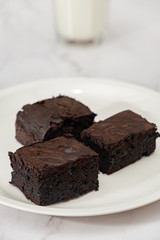 The group of homemade Chocolate Brownies on the white background - Copy Space
