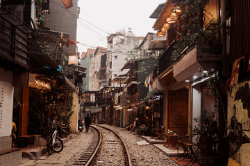 Railway in the city through the streets between old houses, Hanoi,  Vietnam.