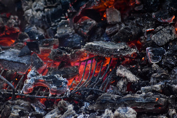 burning charcoal on a barbecue
