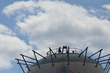 restoration of satellite on a water tower