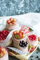 panna cotta berry fitness dessert - three layers of milk jelly pudding, coffee, vanilla and berry - Concept diet