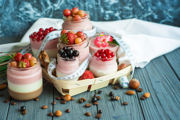 panna cotta berry fitness dessert - three layers of milk jelly pudding, coffee, vanilla and berry -...