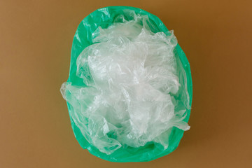 transparent disposable plastic bags on a brown background