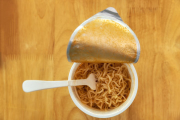 Top view of cup of instant noodle ready to eat, it is convenient and delicious food.