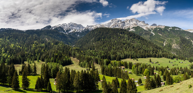 panorama view of an idyllic mountain valley in the heart of the Swiss Alps
