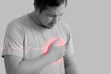 Asian man having chest pain , heart attack , heart disease