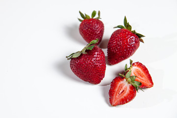 strawberries on a white table