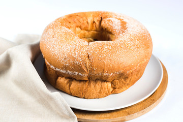 Donut bread with sugar on top on a plate