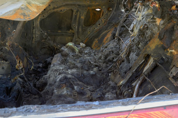 partially burned down parts of the car