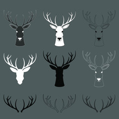 Set with silhouettes of a deer head with horns on a gray background. Mask of a deer. Chess piece in the form of a deer head. Linear graphics. Blank for label, logo or icon.