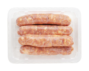 Pork sausages in a plastic packaging tray
