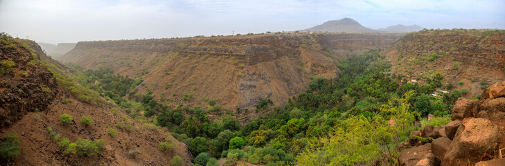 Fototapeta na wymiar View from a plateau into the Vale Ribeira Grande near the town Cidade Velha, Island Santiago, Cape Verde