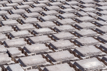 Articulated Concrete Blocks Geometric Background Pattern composed of repeating pieces used for soil...