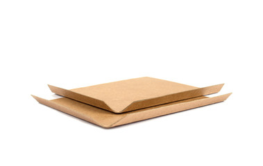 Cardboard slip sheets isolated on white. Alternative packaging concept, paper pallet for...