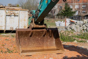 Technology, engineering and construction industry machine concept: View of a large excavator bucket.