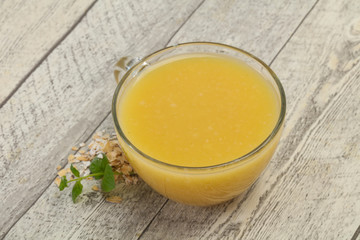 Dietary vegetarian oats milk over wooden
