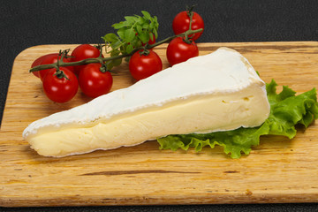 Brie cheese triangle served salad