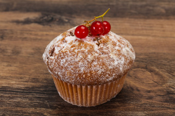 Sweet tasty muffin with red currants