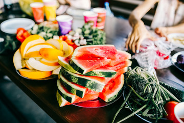 Fresh juicy water melon and melon on table. Reportage shot