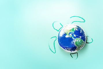 World Turtle Day and save our Sea Concept, May 23, Globe earth with turtle on the light blue green...