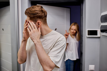 young caucasian woman unhappy that man is constantly messing around, female scream at lazybones,...