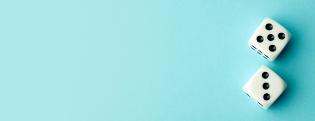 Dice on a blue banner background. Game, business, solutions, concept. Copy space.