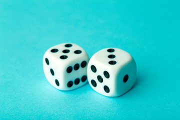 Dice on a blue background. Game, business, solutions, concept. Copy space.
