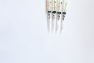 syringes on a white background