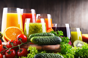 Glasses with fresh organic vegetable and fruit juices