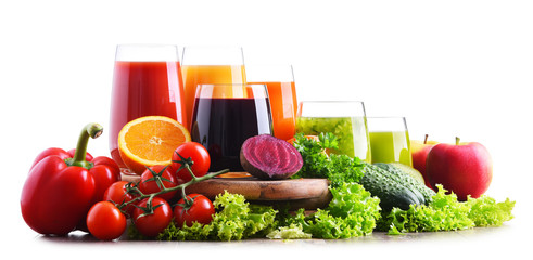 Glasses with fresh organic vegetable and fruit juices