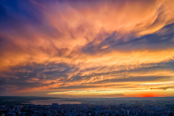 Amazing colorful clouds over the city. Varna, Bulgaria