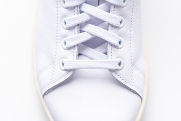 Close-up white sneakers, boot, shoe with shoelaces, sport shoes