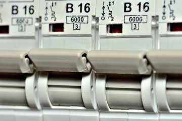 Detail of switches of modern circuit breakers designed for socket circuit to 16 amps max.