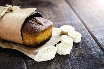 homemade banana cake with banana slices around. Portuguese cake made at home.