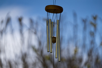 Wind Chimes blowing in the summer air. Natural background. Windy day. Melodic music with tubes....