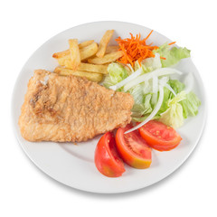 Plate of Roman style hake with chips and salad with lettuce, onion and tomato.