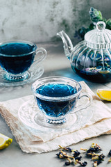 Pea flower tea in a beautiful glass cup, blue tea