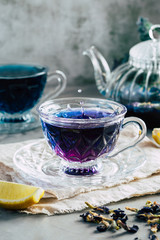 Pea flower tea in a beautiful glass cup, blue tea