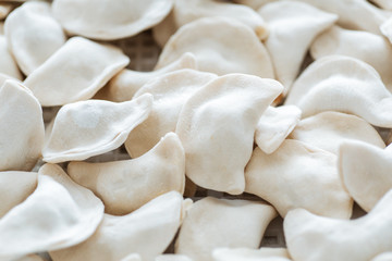 Raw dumplings from the dough in handmade flour.Close up