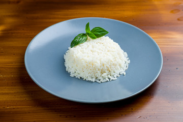 boiled rice on wooden table