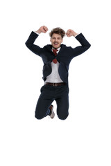 Cheerful businessman laughing and celebrating