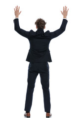 Rear view of guilty businessman freezing as being caught