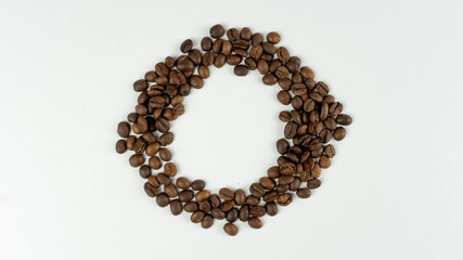 coffee beans on a white background. place for logo. Top view. Flat lay. Mockup