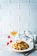 Minced beef tomato sauce pasta in a white plate