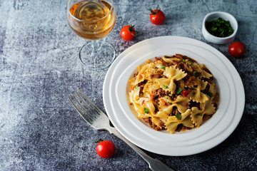 Minced beef tomato sauce pasta in a white plate