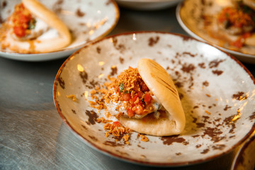 Kebab with rotan in a bun.