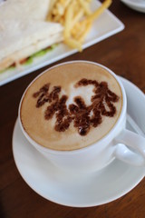 cup of cappuccino with chocolate
