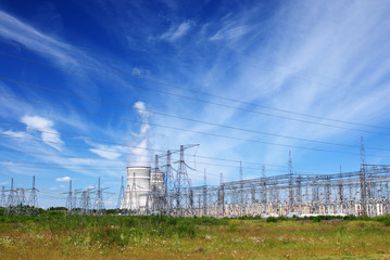 Russian Power plant with two coolers and violet flowers around it