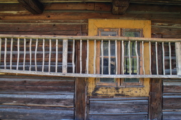 Window and ladder in Log cabin in Nizna Boca village and municipality in Liptovsky Mikulas district, central Slovakia