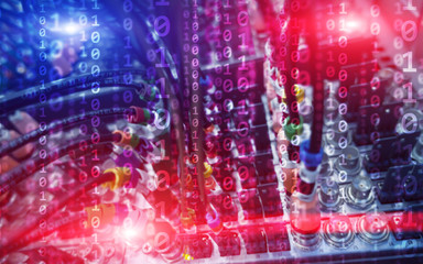 Multi-colored Binary code matrix digital internet technology concept on server room background.